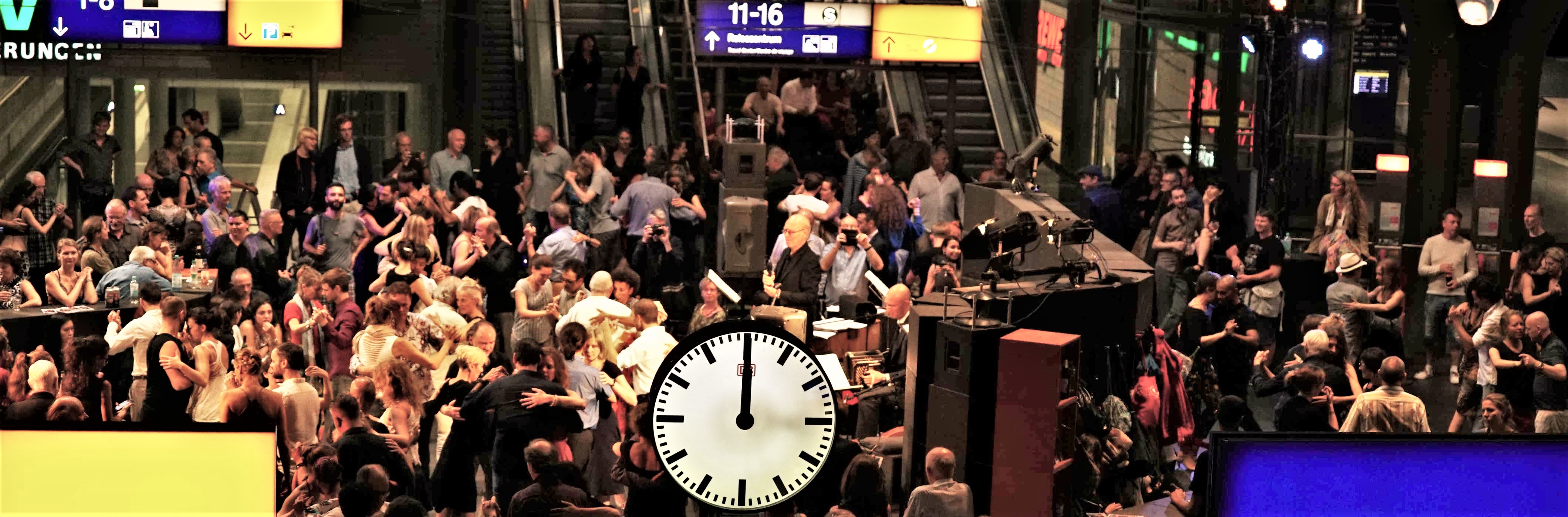 Contemporary Tango Festival in the center of Berlin Central Station. Dancing at midnight, creating a unique atmosphere in a magnificant urban place